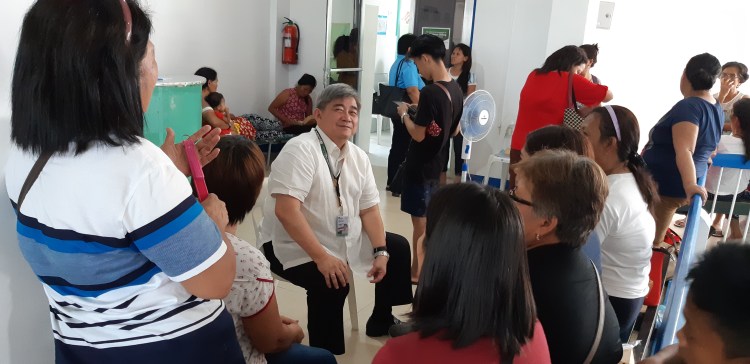 Dr. Juan Antonio Perez talks to women about to undergo bilateral tubal ligation at Ziga Memorial Hospital in Tabaco City, Albay in March 2019
